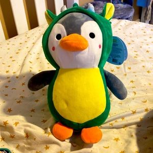 Hug me penguin squishmallow with dragon costume